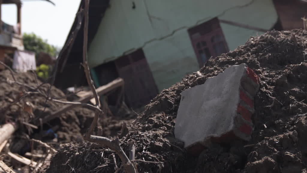 Two weeks on, thousands still cut off and left waiting to recover