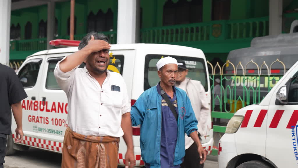 Rescuers race to free trapped children in Indonesia