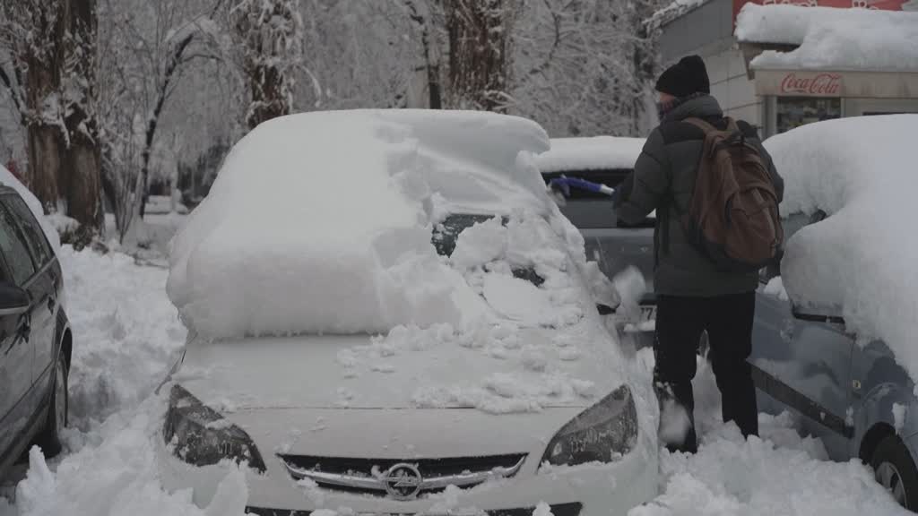 Snowfall charms, but snarls journeys across Europe