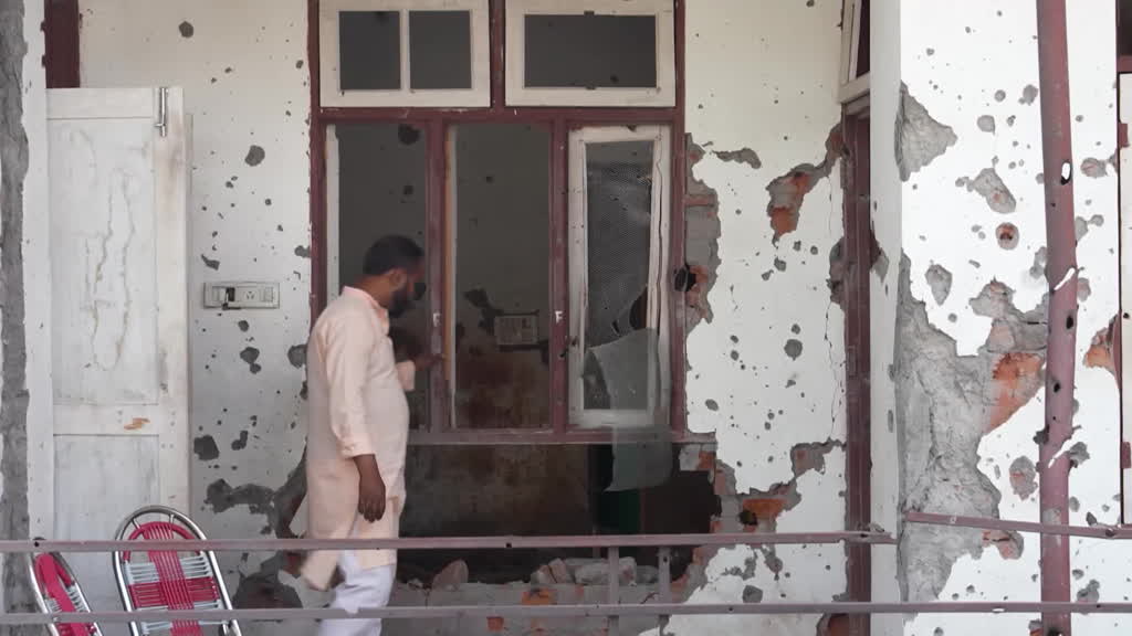 People in Kashmir describe their losses from among the ruins