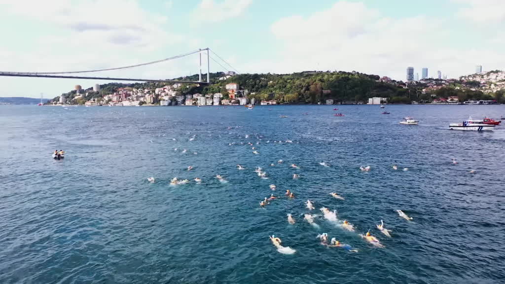 Thousands swim between continents in iconic Istanbul race