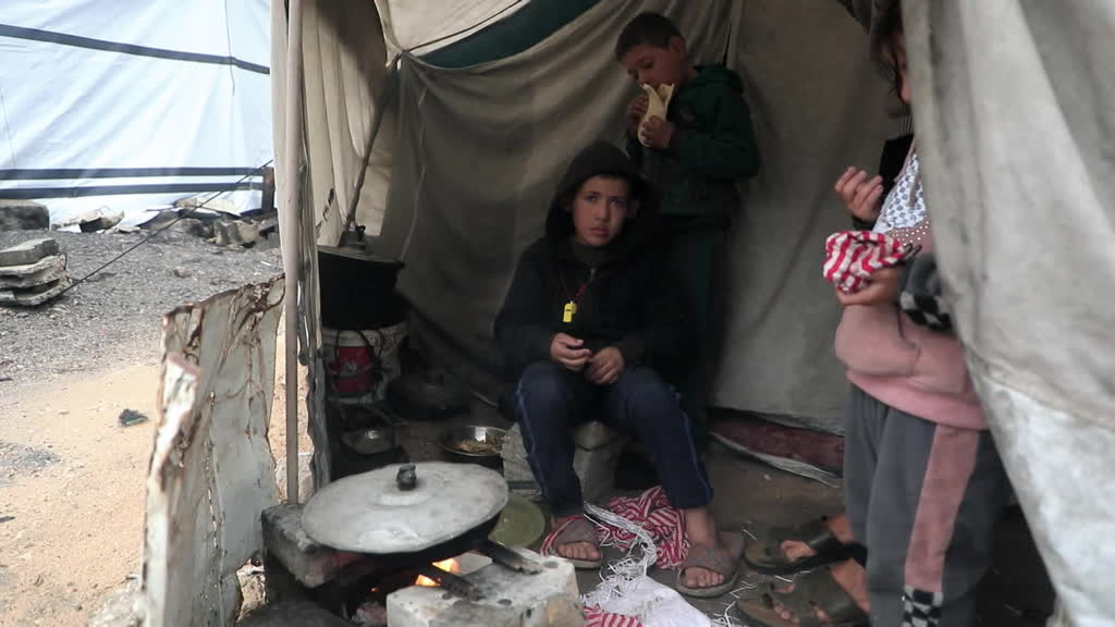 In Gaza, flooded shelters make life unbearable for displaced